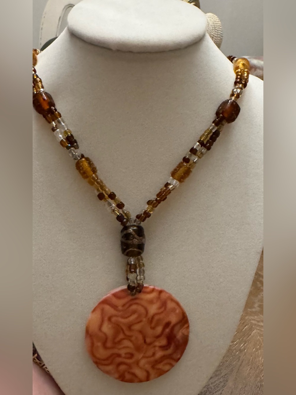 Handmade Amber Bead Necklace with Marbled Orange Pendant